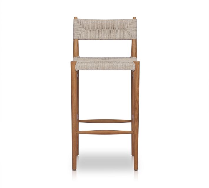 Full view of a wooden bar stool with woven seat and backrest.