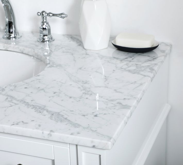 Marble countertop edge with faucet and soap dish