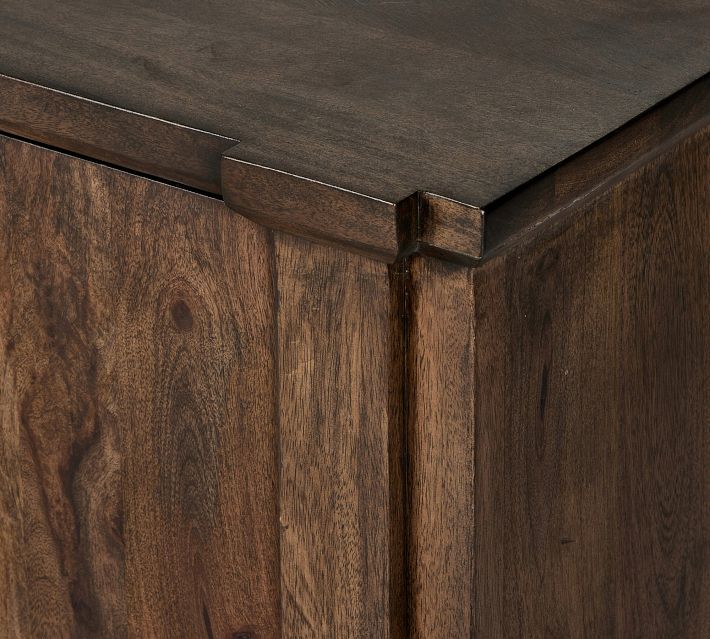 Close-up of top edge and corner seam of cabinet