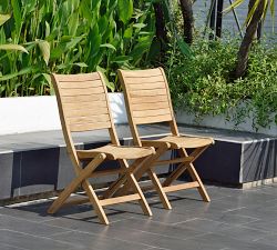 Nassau 11-Piece Teak Oval Outdoor Table with Maya Folding Dining Chair Set