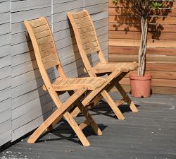 Nassau 11-Piece Teak Oval Outdoor Table with Maya Folding Dining Chair Set