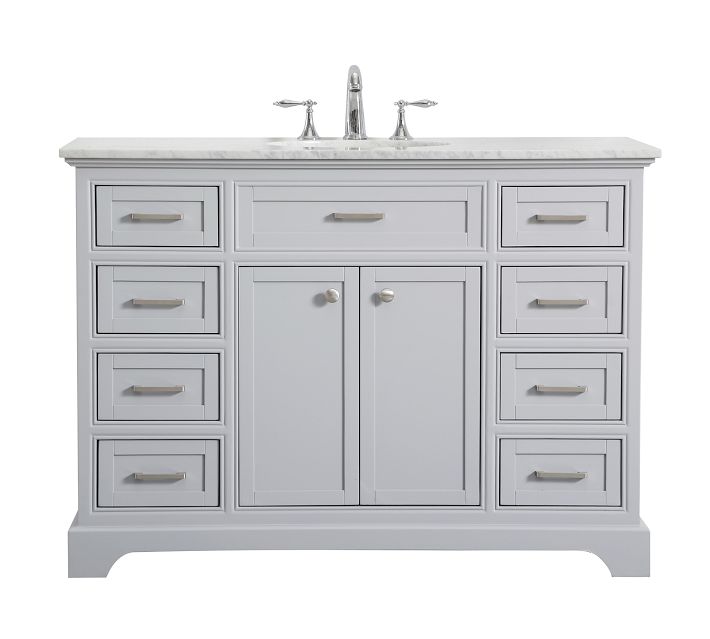 Front view of a gray vanity with multiple drawers and central cabinet doors
