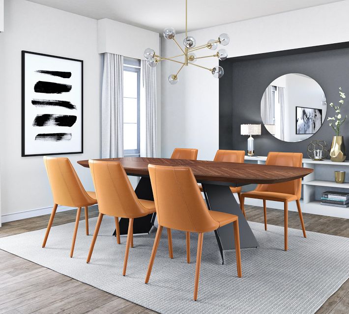 modern dining room with orange-brown chairs around wooden oval table