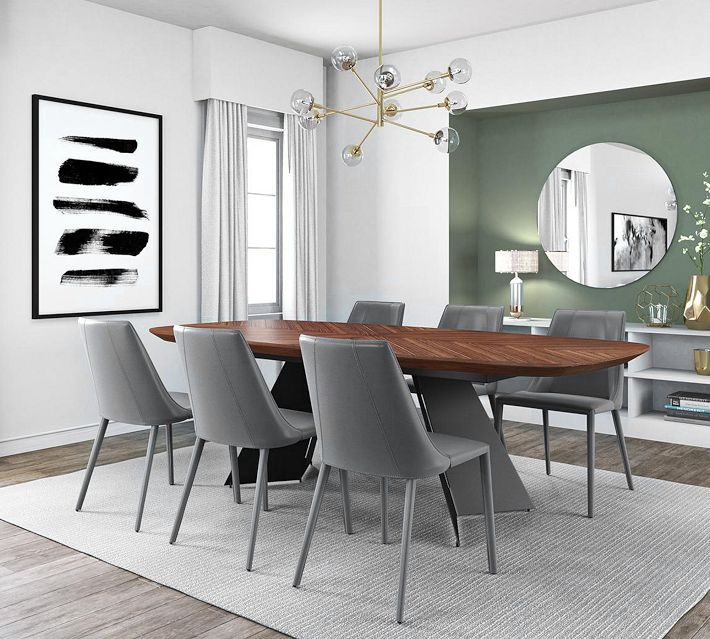 living room with round table and orange chairs