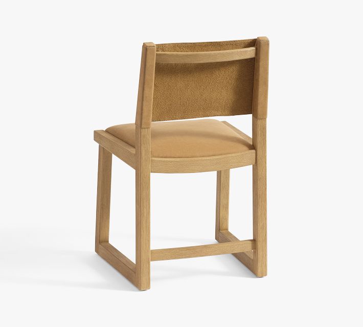 Rear three-quarter view of the chair showing back and legs