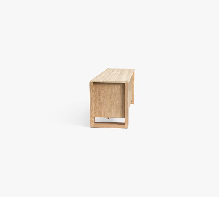 Small side view of a compact wooden bench or console in same light wood finish