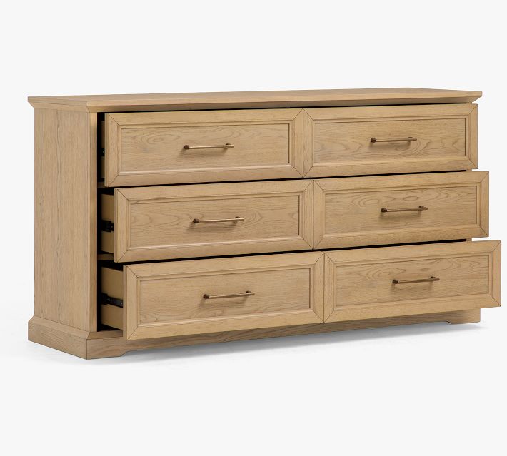 Another angle of the dresser showing three upper drawers and slanted front.