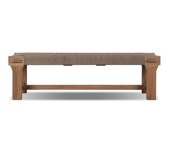 A wooden bench with woven seat and two drawers on the ends, isolated on white