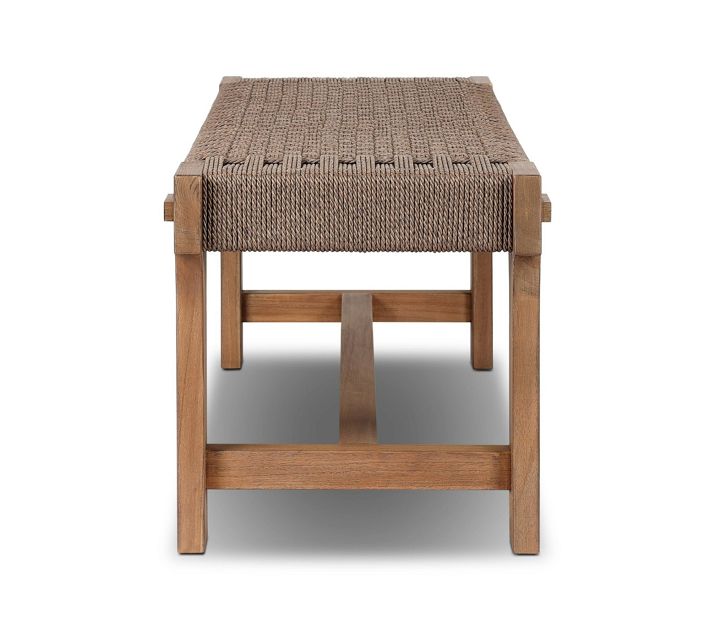 Top-down view of the woven bench showing braided seat pattern