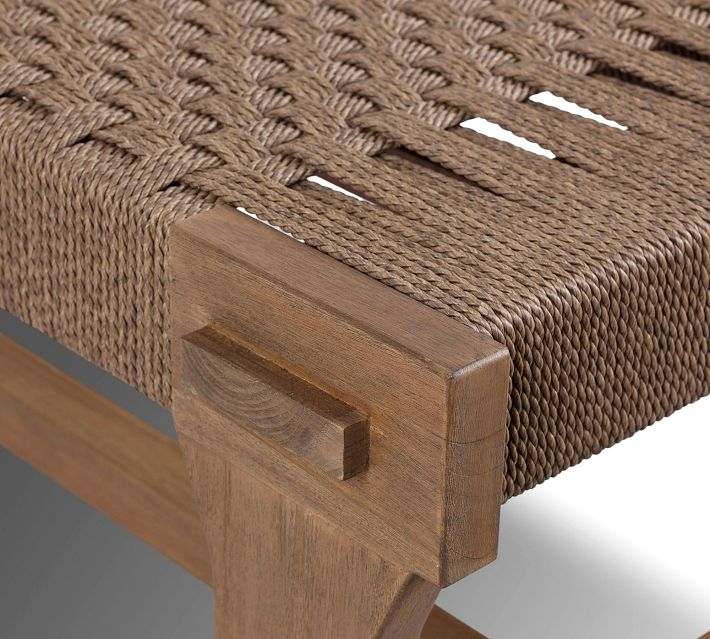 Corner of wooden leg and frame with visible joint and weave transition