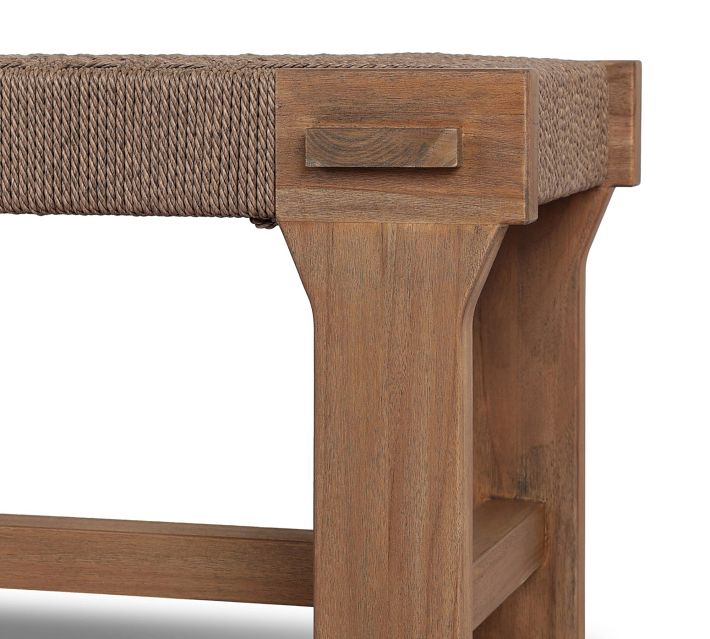 Side view of wooden leg and support beam of the bench