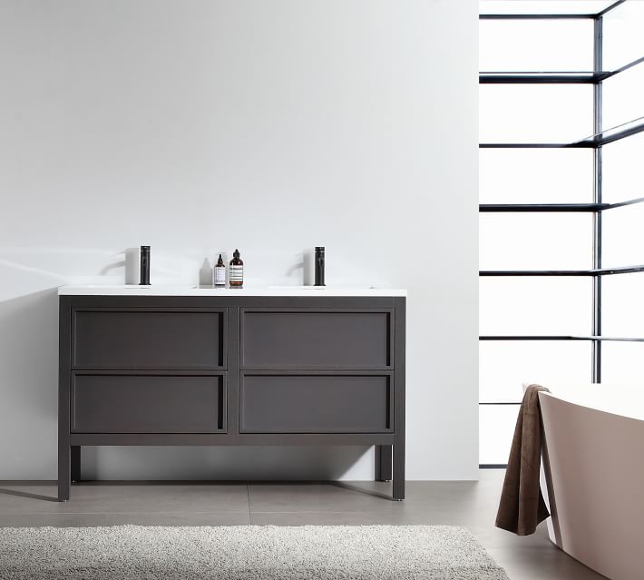 Bathroom vanity against white wall with window bars visible.