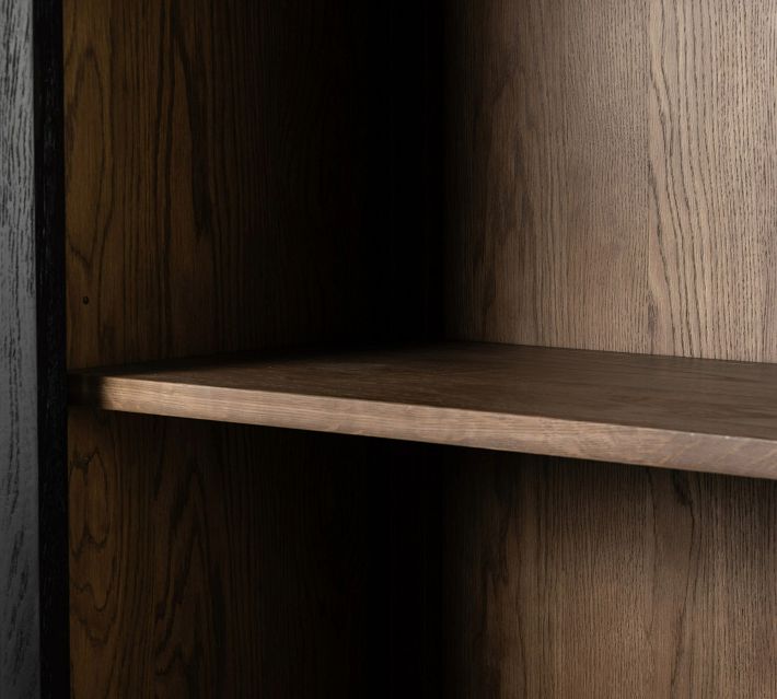 Close-up of interior shelf inside the cabinet with wood grain.