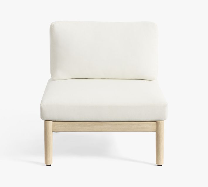 Single white cushioned lounge chair with wooden frame