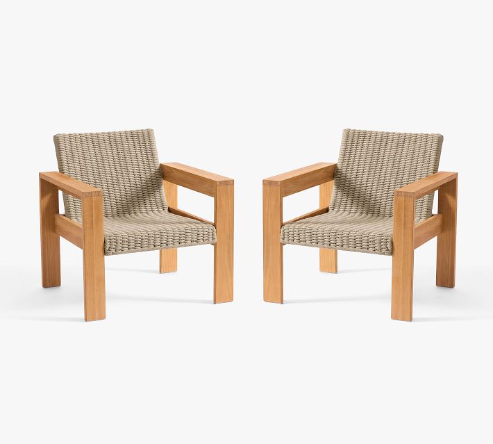 Two beige woven armchairs with wooden frames facing each other