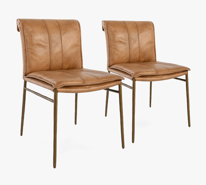 Pair of tan leather chairs with metal legs