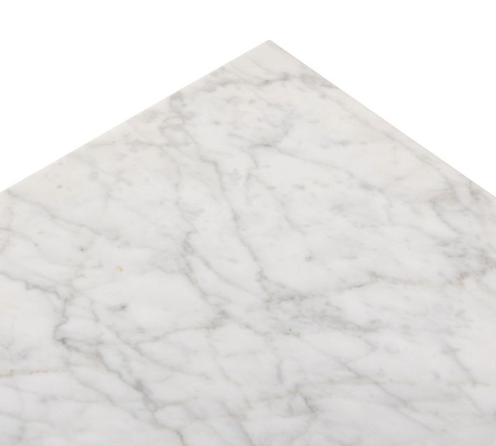 Close view of marble tabletop surface showing veining