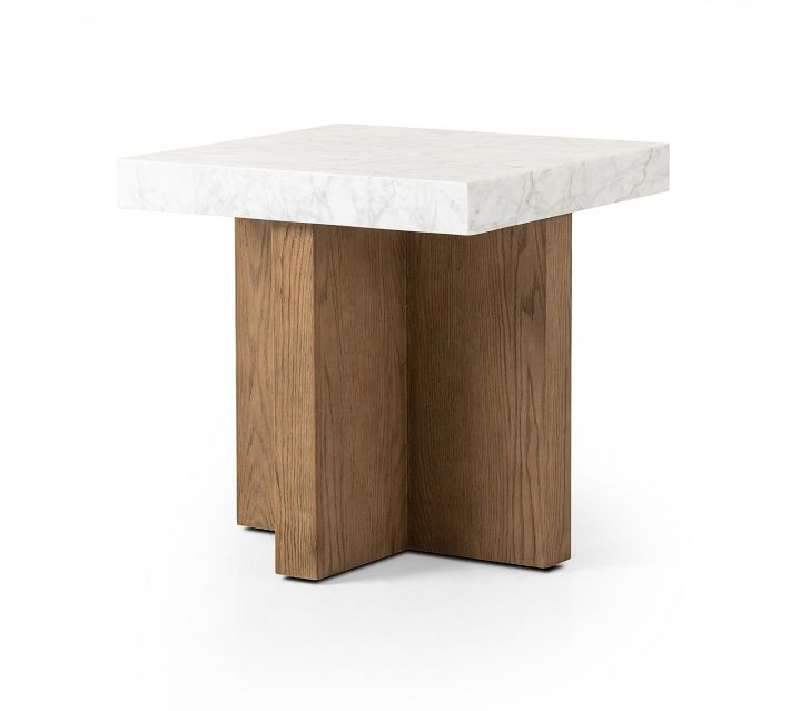 Wood and marble pedestal table with a white marble top and a sculptural wooden base