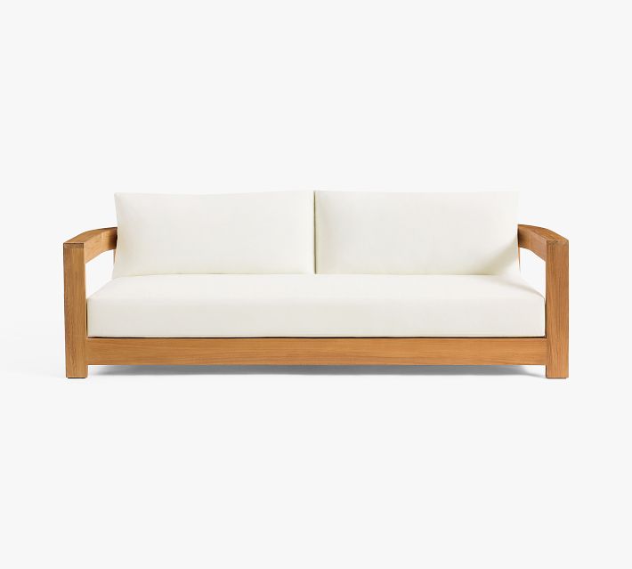 White cushioned sofa with wooden frame