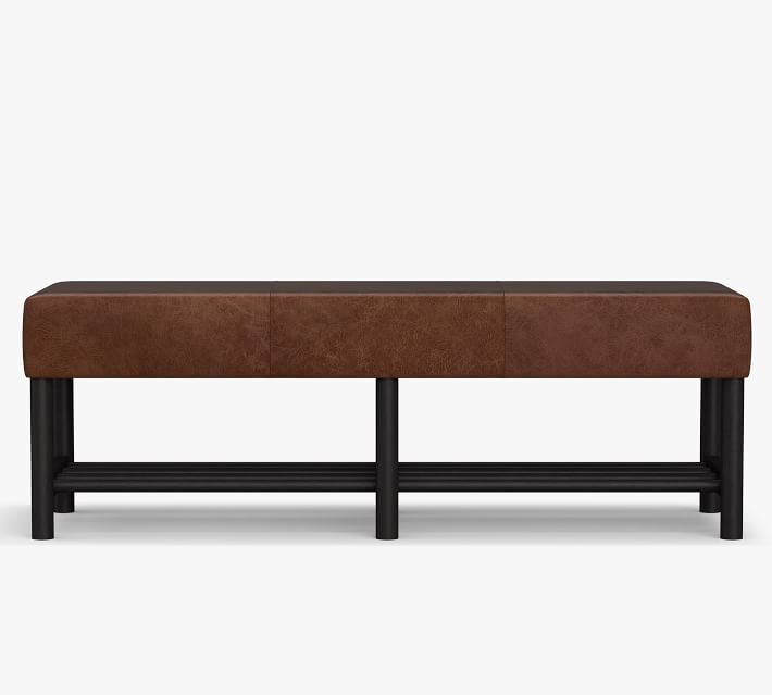 Brown leather bench with black metal legs showing modern industrial style.
