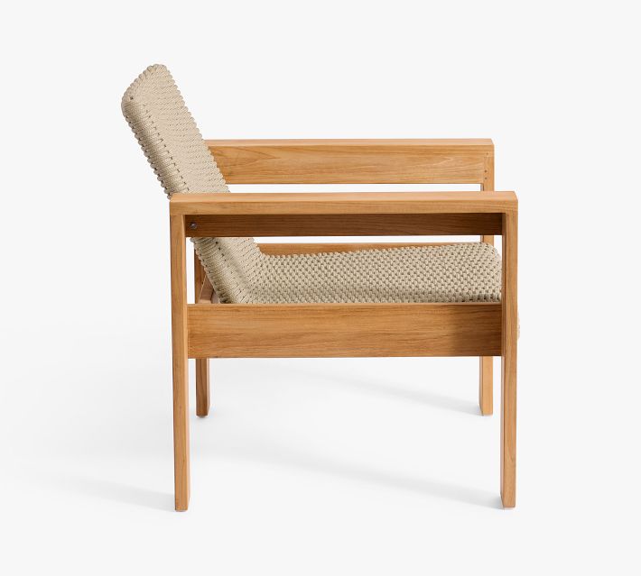 Side view of the beige woven armchair with wooden frame on white background