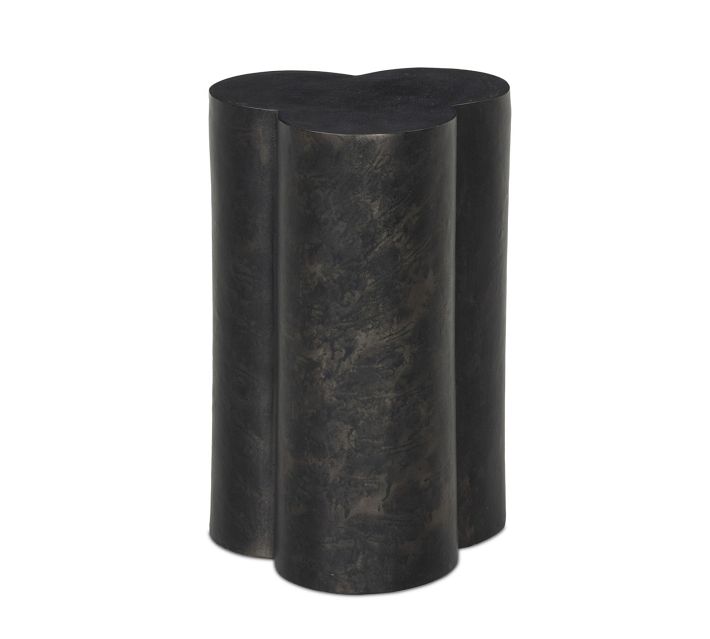 Close-up of the dark metal base with layered cylindrical shapes