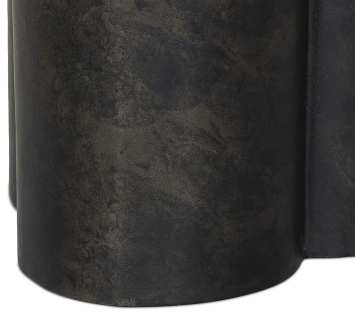 Lower portion of metal cylindrical base with patina marks