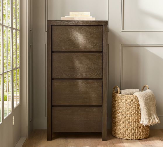 dresser 4 drawers Frances Woven Rattan Tall Drawer Dresser, Natural This dresser has four drawers on metal runners and safety stops Jela-USA Solid Wood 4 Drawer