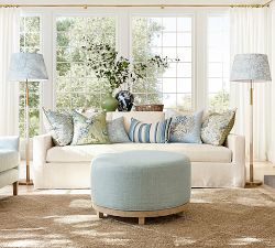 Jake Swivel Upholstered Wood Base Ottoman