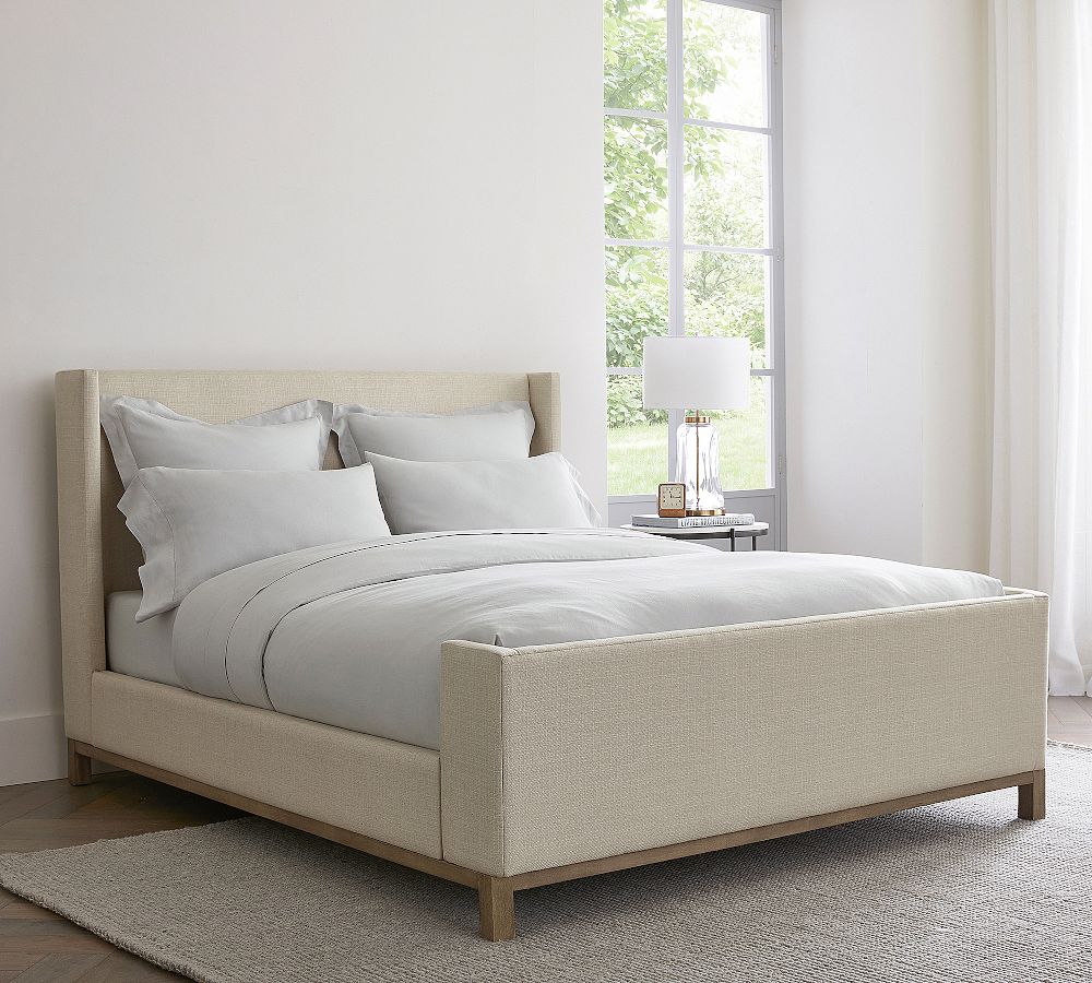 Jake Upholstered Platform Sleigh Bed with Wood Base by Pottery Barn