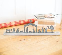 Metal Nativity Scene On Wooden Stand