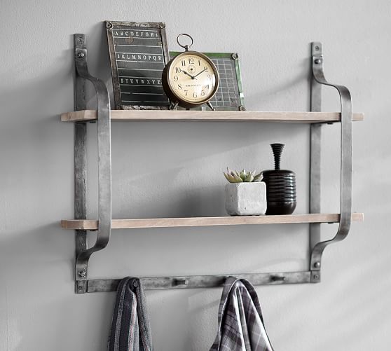 shelf with hooks above couch
