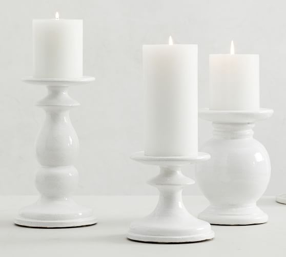 white candle stick holders