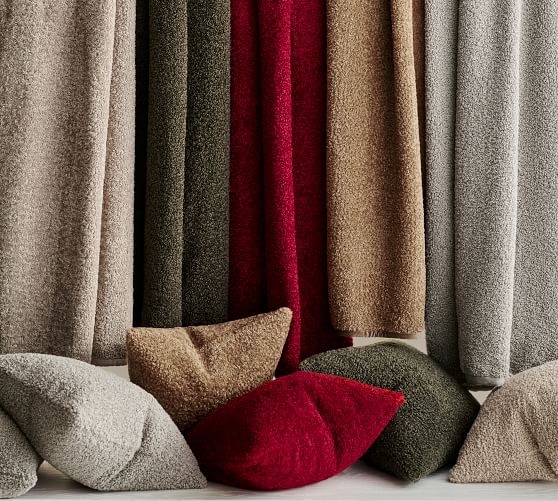 red throw blanket and pillows