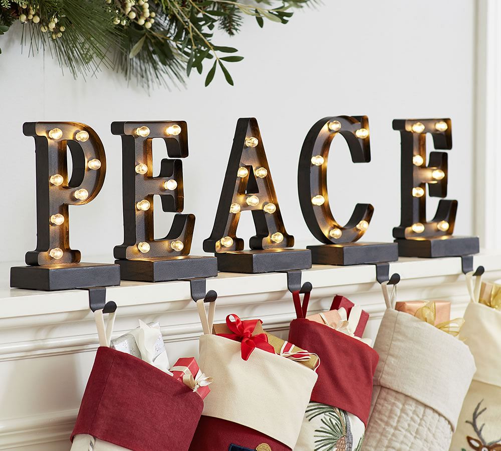 Lit Bronze Stocking Holder Peace Pottery Barn