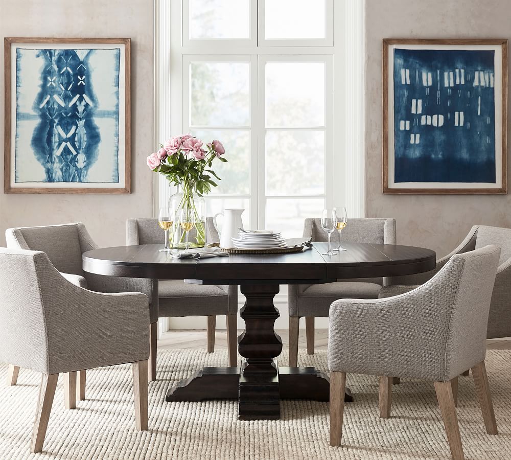 A pottery barn Banks Round Pedestal Extending Dining Table