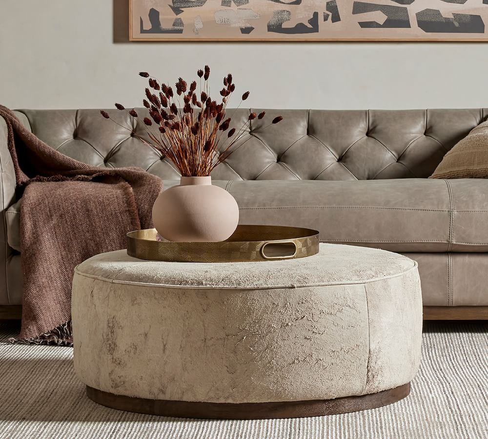 Arroyo Round Upholstered Ottoman | Pottery Barn