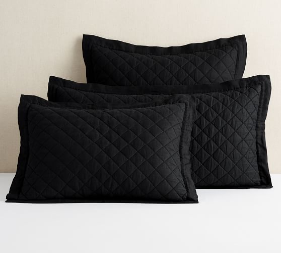 black quilted pillow shams