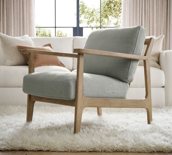 grey upholstered armchair