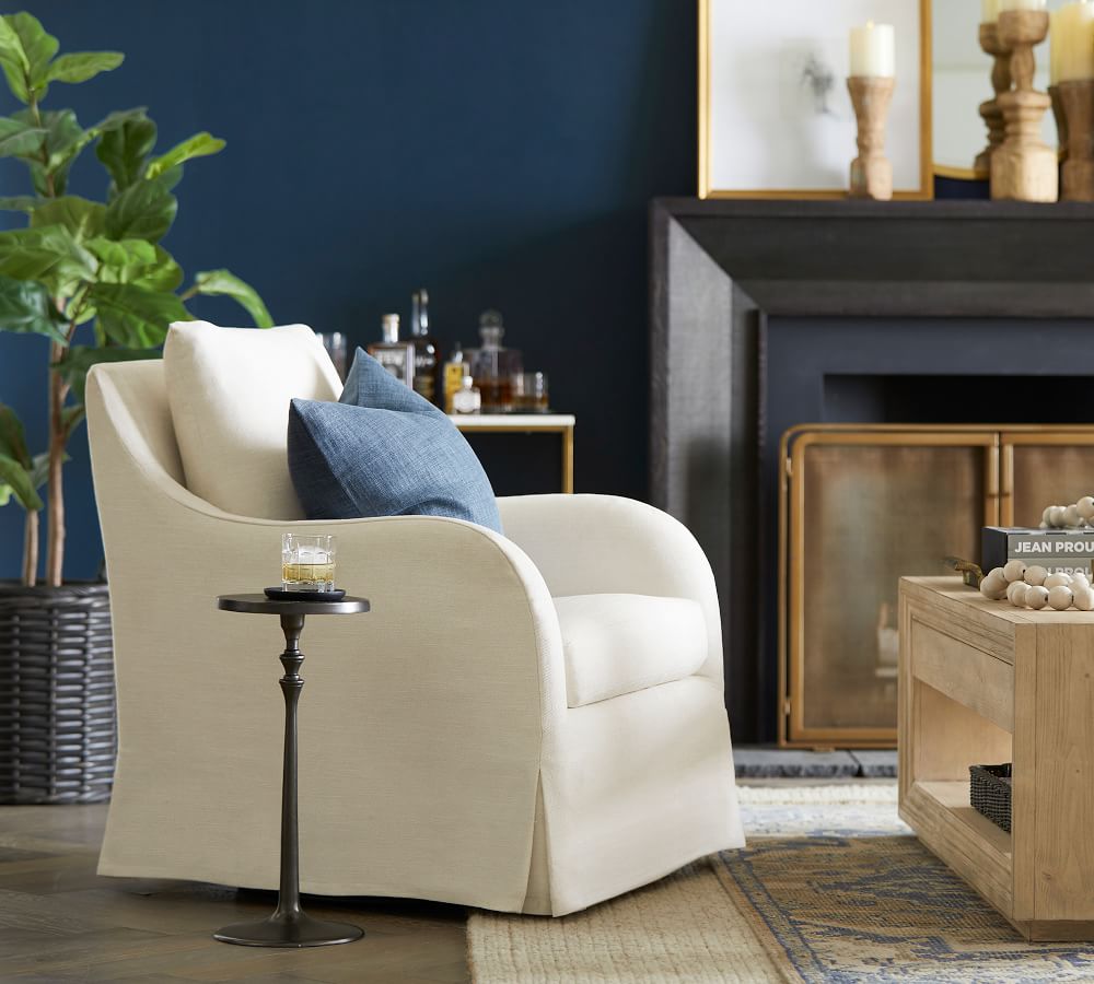 swivel slipcovered armchair