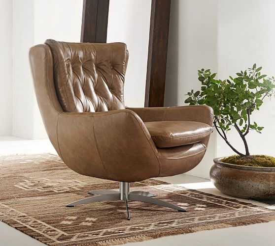 wells upholstered swivel armchair