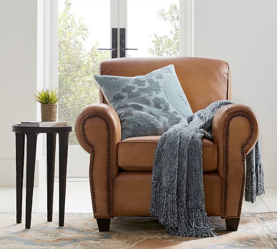 white leather chair with nailheads