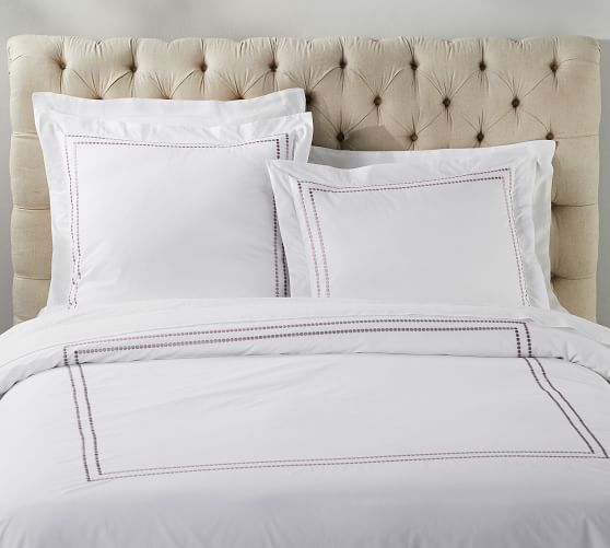 white duvet cover with purple trim