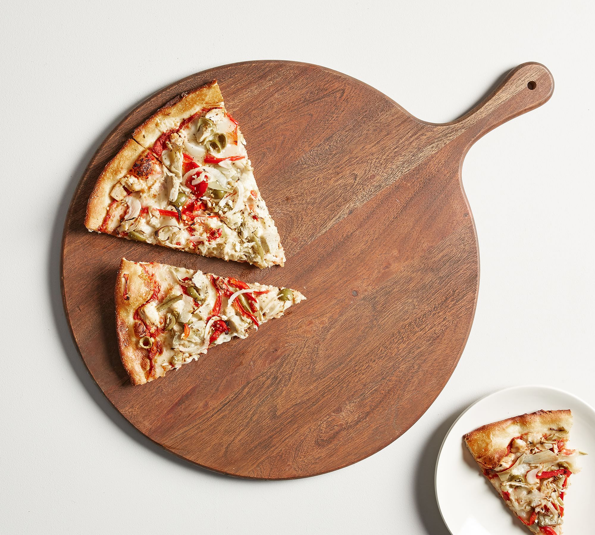 wedding registry ideas Chateau handcrafted acacia-wood pizza paddle from Pottery Barn