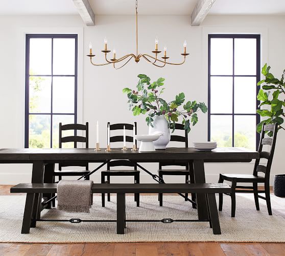 wood and black dining table with bench