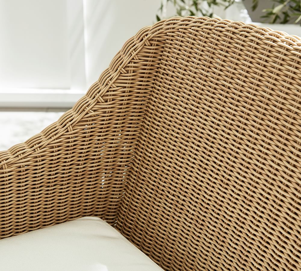 Hampton AllWeather Wicker Swivel Dining Chair Pottery Barn