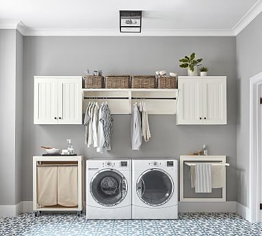 https://assets.pbimgs.com/pbimgs/rk/images/dp/wcm/202327/0004/aubrey-deluxe-laundry-organization-set-with-closed-cabinet-m.jpg