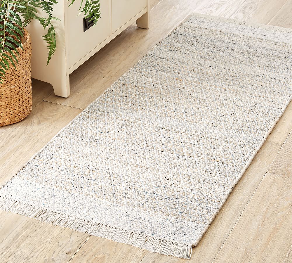https://assets.pbimgs.com/pbimgs/rk/images/dp/wcm/202330/0066/caelan-synthetic-rug-with-anti-slip-backing-l.jpg