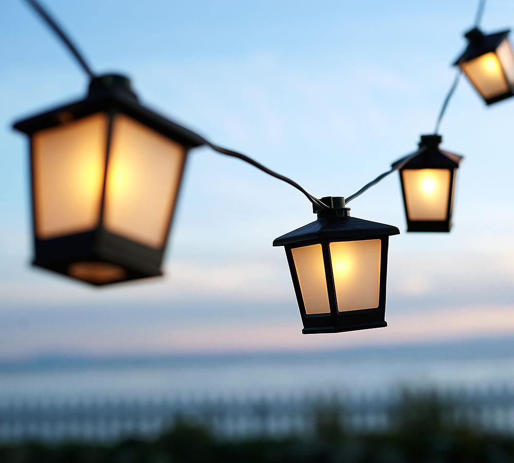 https://assets.pbimgs.com/pbimgs/rk/images/dp/wcm/202332/0646/malta-mini-lantern-string-lights-l.jpg