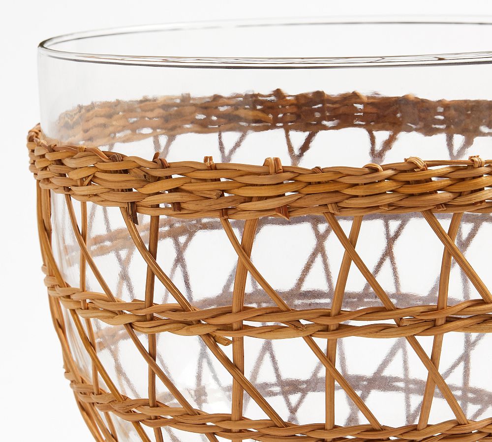 Glass salad bowl with woven rattan holder